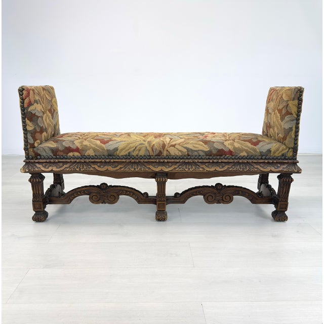 Dimensions: SH 16.5” x W 49.3” x D 14.5” Antique French carved wood needlepoint bench with nailhead trim detail. Please...