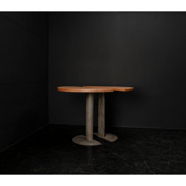1980s design console table made of steel and oak wood. With its minimalist aesthetic, it stands out through its...