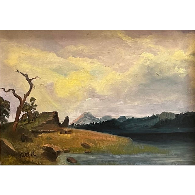 Oil painting on hardboard of a country landscape with luminous clouds, mountains in the distance, resolving to a stream in...