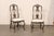 A Swedish pair of period Rococo side chairs, with upholstered seats, from the 18th century. These antique chairs from...
