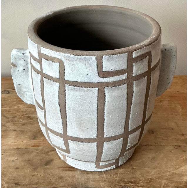 Presenting a captivating vintage Boho glazed ceramic vase, a true testament to mid-20th-century artisanal craftsmanship....