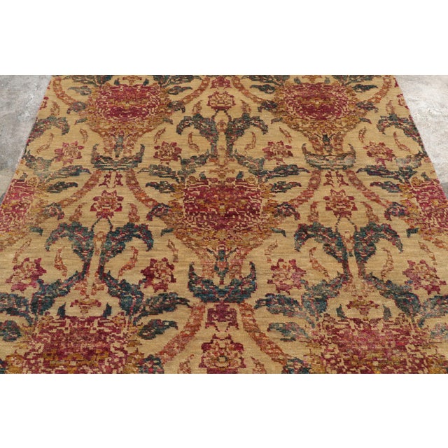 Made with a luxurious blend of natural silk and wool, this 6x9 rug is a vibrant addition to Rug & Kilim’s Transitional...