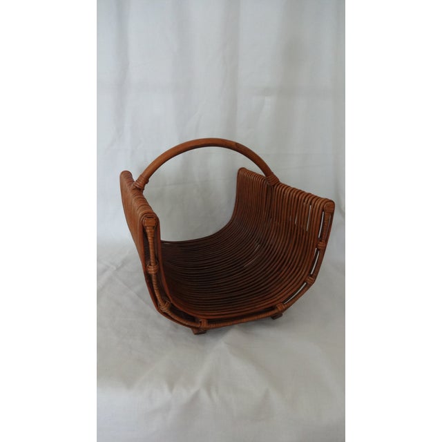 Wonderful large vintage reed rattan basket that would look great with either magazines, towels or whatnot. From the later...