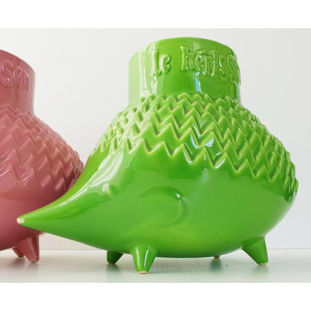 Good condition, but each snout has a chip. Two chips on the green body. Three chips on the pink body and chips on the...