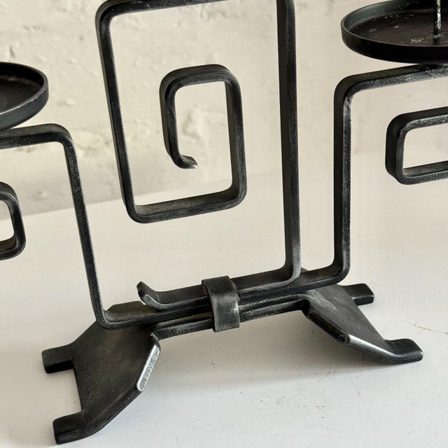 A brilliant hand forged holder for 3 candles with spiral metalwork. Measurements W: 29cm H: 19.5cm Condition Used vintage...