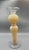 This substantial decorative candle holder features a classic urn-inspired silhouette with a broad flat top designed to...