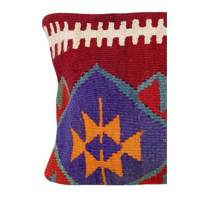 Add a touch of history and warmth to your space with this vintage handmade Turkish wool kilim cushion cover. Crafted from...