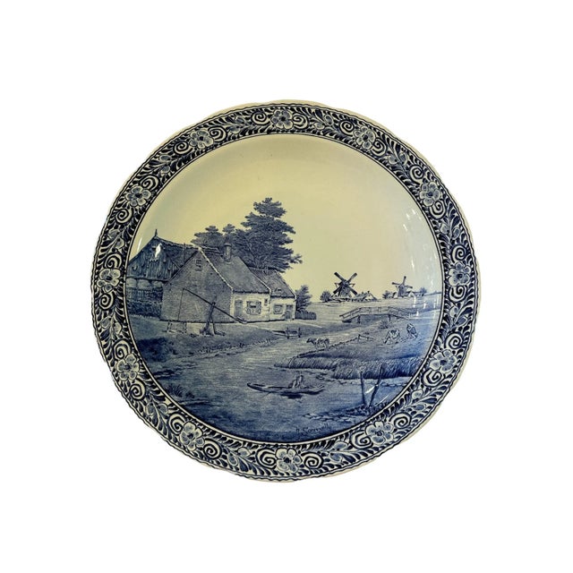 This classic large blue and white Delft Boch plate is 1/3. In addition to serving in beautiful tablescapes, this...