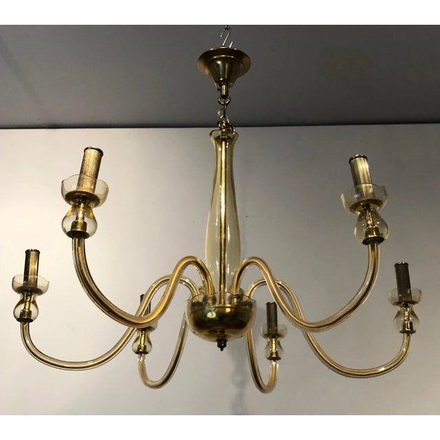 This pair of chandeliers is made of champagne crystal. This is an Italian work from Murano. Circa 1970