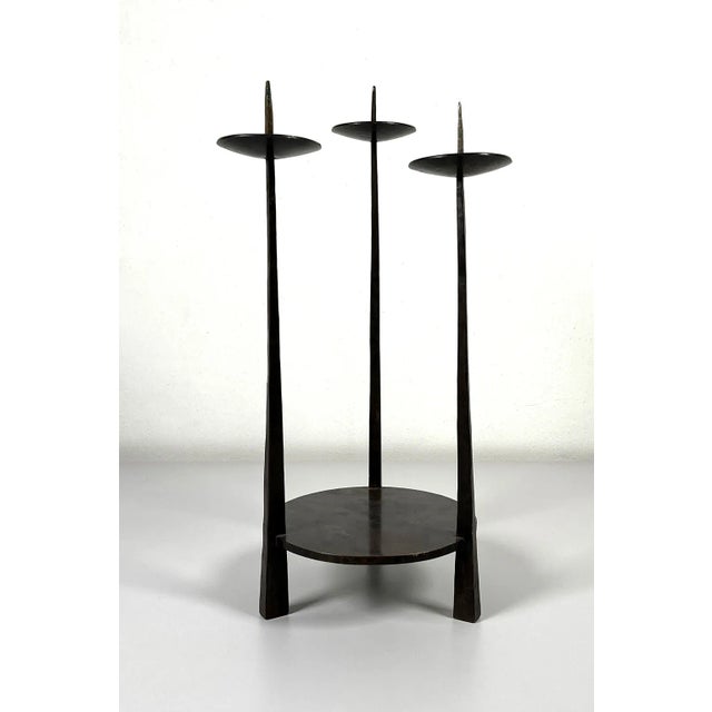 Beautiful bronze candelabra which can hold 3 candles. The candle holder originates from Germany and is signed...