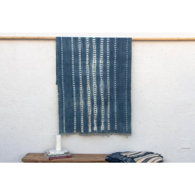 Hand-woven by master weavers of the Mossi and Dioula traditions in Burkina Faso, West Africa, these vintage textiles are...