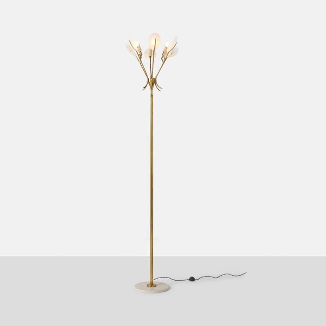 Floor Lamp by Arredoluce Italy, c1950s A tall floor lamp made by Arredoluce with brass arms and a travertine base....