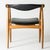 “Yoke” armchair by Hans J. Wegner, made from oak with a black leather back and seat. Striking silhouette with cool details...