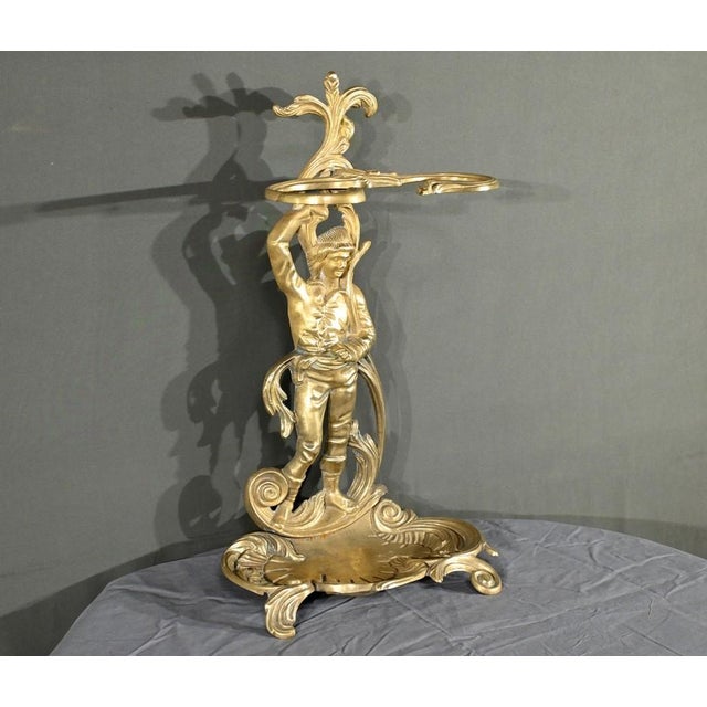 This brass umbrella stand, from Italy and dating from 1940, is a remarkable piece of art nouveau style. It is...