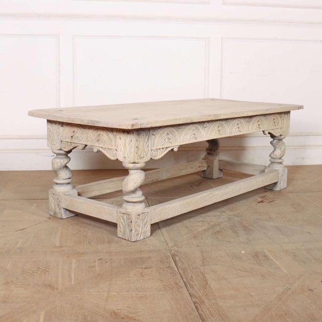 18th Century bleached and carved oak coffee table. 1760 This piece is designed in the style of the selected designer...