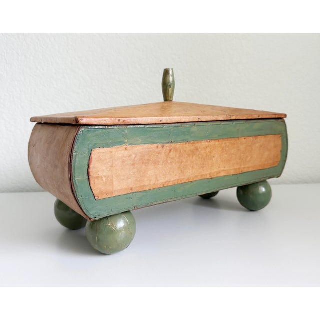 Large 18" primitive folk art style box featuring goat skin wrapped top and side panels and green painted accents. The box...