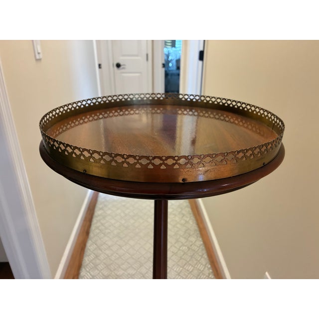 This elegant vintage pedestal plant stand brings times less charm and functionality to any space. Crafted from rich...
