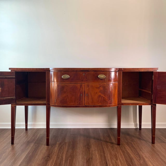 Monumental Hepplewhite (of period) mahogany sideboard circa 1780-1820, featuring satinwood string inlay, of period brass...