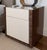 Pair of custom-designed nightstands featuring a refined combination of high-gloss lacquer drawer fronts and richly grained...