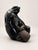 A striking blackware ceramic Mother and Child sculpture by New Mexico artist Lawrence Vargas, signed and dated 1994. Its...