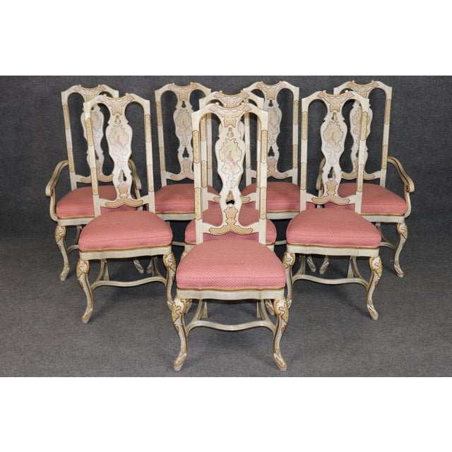 Elevate your dining experience with this exquisite set of eight 1960s era Italian style dining chairs, featuring six side...