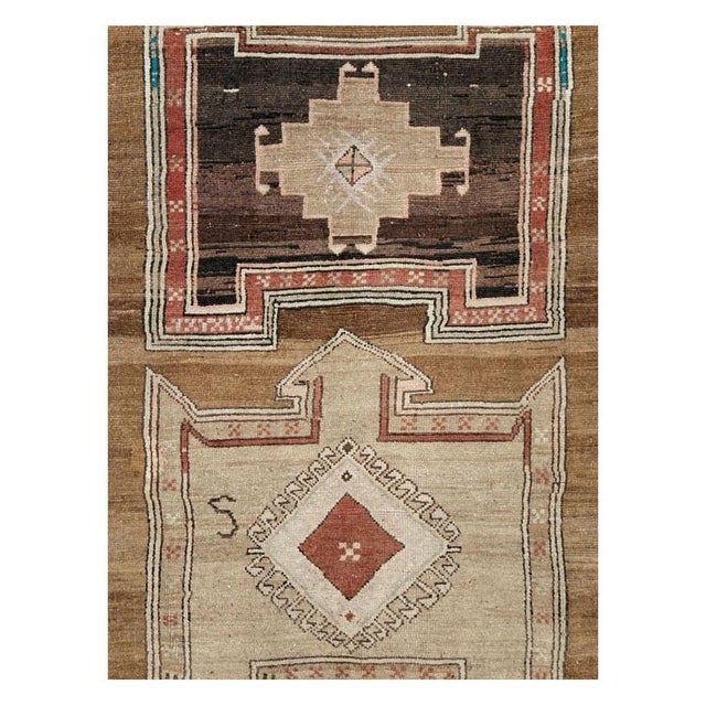 A vintage Turkish Anatolian room size rug handmade during the mid-20th century with a geometric tribal design. Measures:...