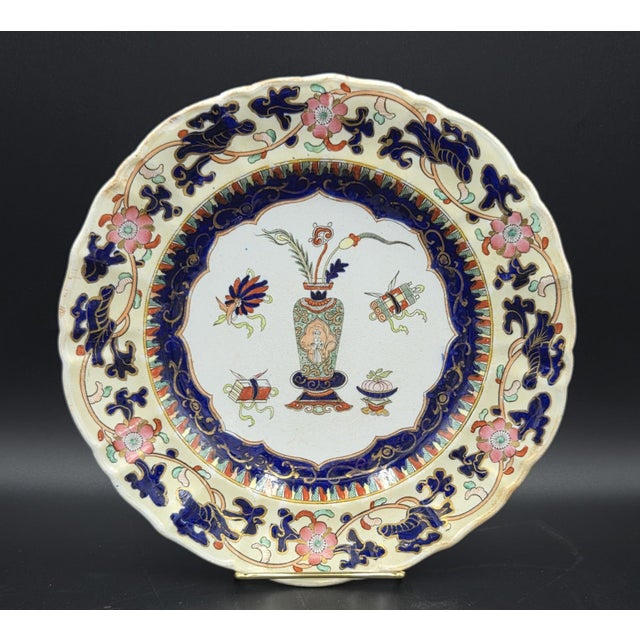 This beautiful antique plate is one of Mason's Patent Ironstone dinner plate, featuring the "Chinese Antiquities" pattern....