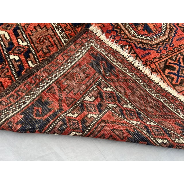 Antique Afghan Baluchi Rug With Geometric Tribal Medallion Design in Terracotta and Navy Rug For Sale - Image 9 of 11