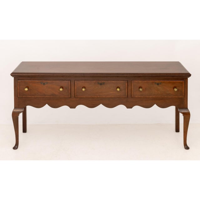 American Queen Anne Style Walnut Sideboard, with three drawers above cabriole legs, Kittinger Buffalo burnished mark and...