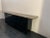 Sideboard 70's black glossy base and top in crystal quartz, side doors, 2 central reduced with an upper compartment with...