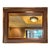 This is a spectacular big gold mirror with a beautiful, delicate pattern in the wide frame. It is almost a rose-gold, but...