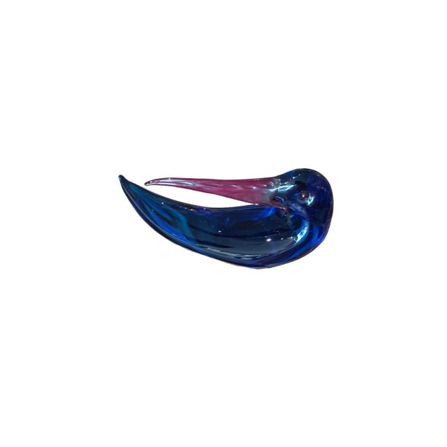 Vintage handblown glass art bird sculpture. Body of bird is a royal blue with a reddish beak. Unsigned