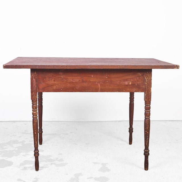 Authentic antique sheraton pine tavern table dating to the late 1700s or early 1800s. Features a wide plank top, deep...