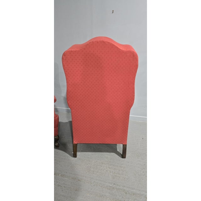 Superb pair of English mahogany porters chairs, serpentine shaped hoods, feather-filled cushions, slight fading to arms,...