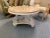 Pretty vintage French Neoclassical coffee table in the style of Rose Tarlow. The round top is made of a thick slab of...