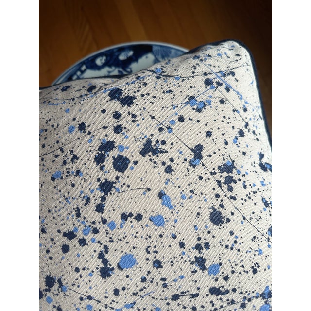 This is a one of a kinda, hand painted heavy weight canvas pillow in natural pipped with navy. The splatter paint details...