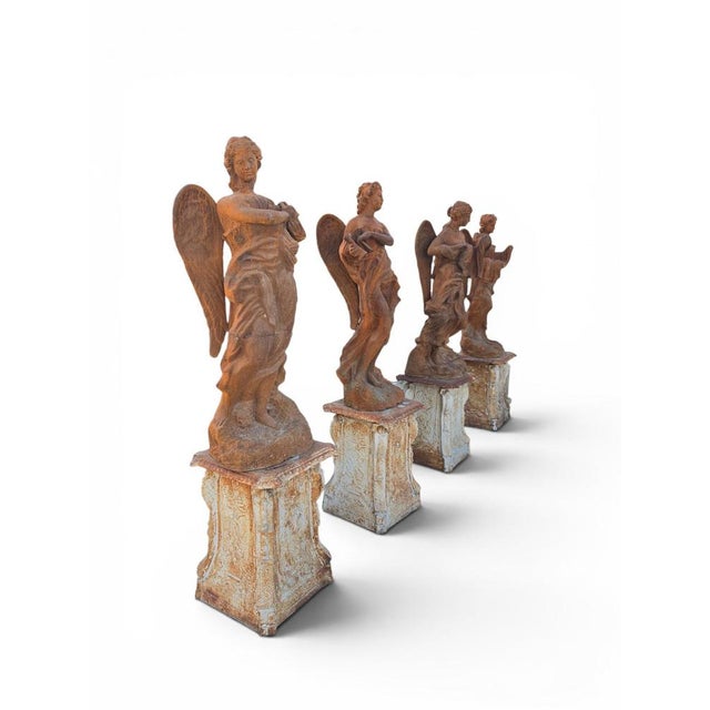 Impressive set of four monumental sculptures representing the allegorical figures of the Four Seasons. Crafted in...