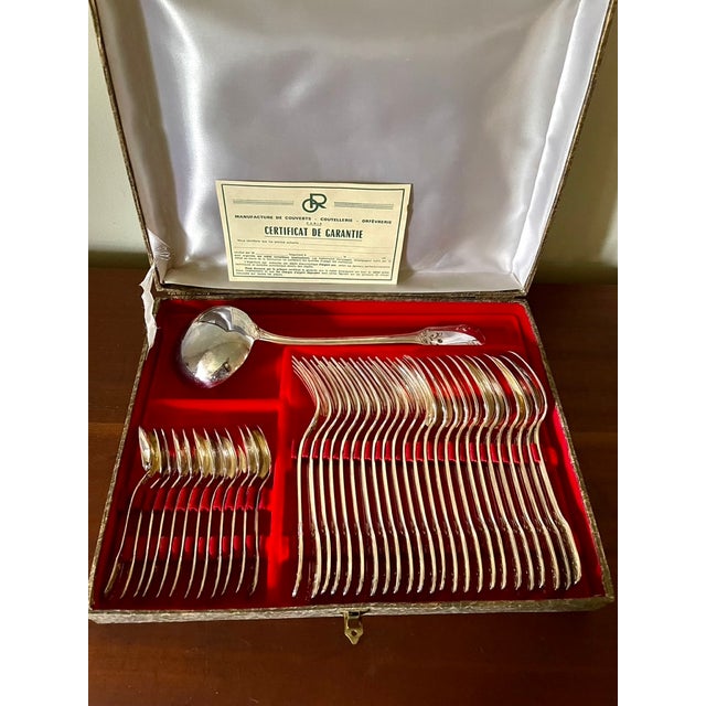 36-piece silver-plated flatware set from the 1950s with a floral and plant motif. 12 forks. 12 soup spoons. 12 dessert...