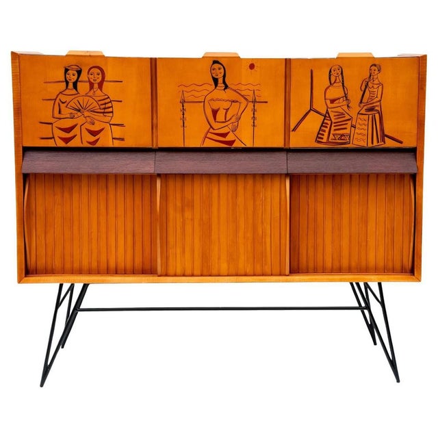 Living room cabinet, 1950s, Made in Italy. Ash and Indian rosewood living room cabinet with walnut veneered drawers. The...