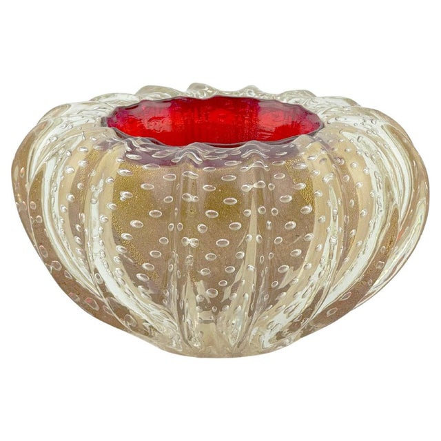 Executed by barovier & toso in murano during the 1980s, this sculptural glass bowl presents a vibrant interplay of colour,...