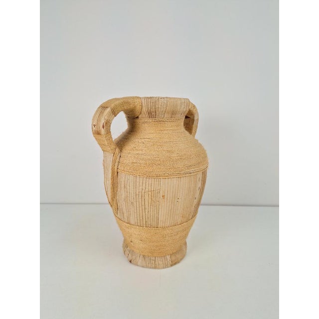 Mid-century terracotta jar vase with handles, 1950s. Terracotta amphora with handles, with rounded shape. Measurements in...