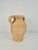 Mid-century terracotta jar vase with handles, 1950s. Terracotta amphora with handles, with rounded shape. Measurements in...