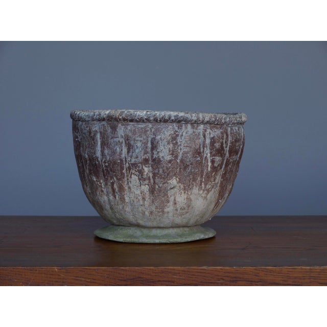 An attractive lead planter with a superb patina. Definite signs of age and use - but these add to its charm and desirability.