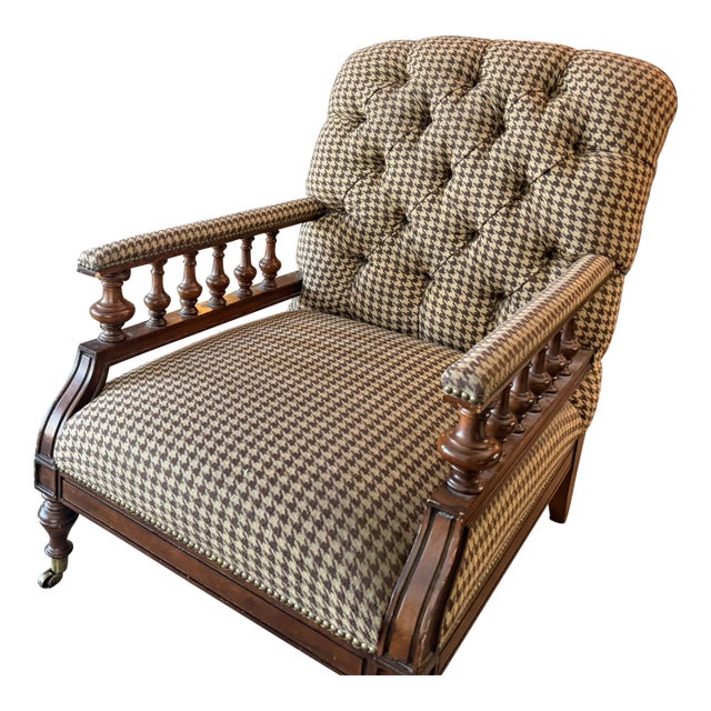 A true classic with serious style credentials. This Ralph Lauren spindle chair is upholstered in a rich brown and beige...