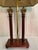 Neoclassical Double Column Table Lamp with wood columns and brass Corinthian pediments on a wood base. Hard Black shade...