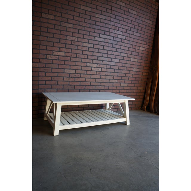 Cottage coffee table from the Tango Collection by Ethan Allen. Simple clean lines make this cocktail table casual with an...