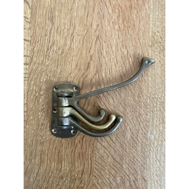 Add timeless functional style to your entry, hallway, bath, or closet with this vintage wall-mounted coat and hat hook....
