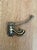 Add timeless functional style to your entry, hallway, bath, or closet with this vintage wall-mounted coat and hat hook....