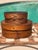 A pair of antique bentwood boxes in the Shaker tradition, comprising one oval and one round example, both displaying the...
