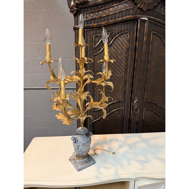 18th Century French style lamp dates from the 1900's. Made from gilt tole with a painted plaster/wooden gray base....